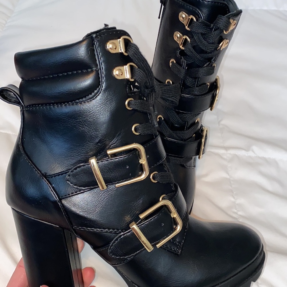 Black faux-leather combat boots